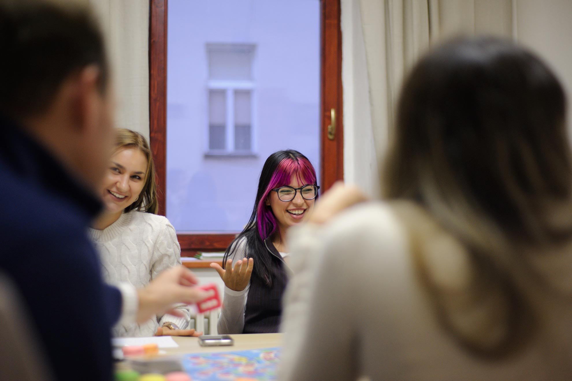 Learning-languages-with-passion Small classes at Language Atelier German Courses. Students smiling during a German class